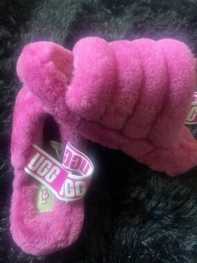 Pink fur Ugg Slides